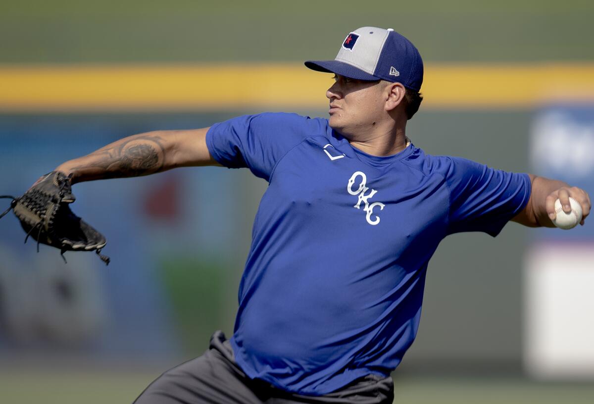 Los Angeles Dodgers relief pitcher Victor Gonzalez works in the