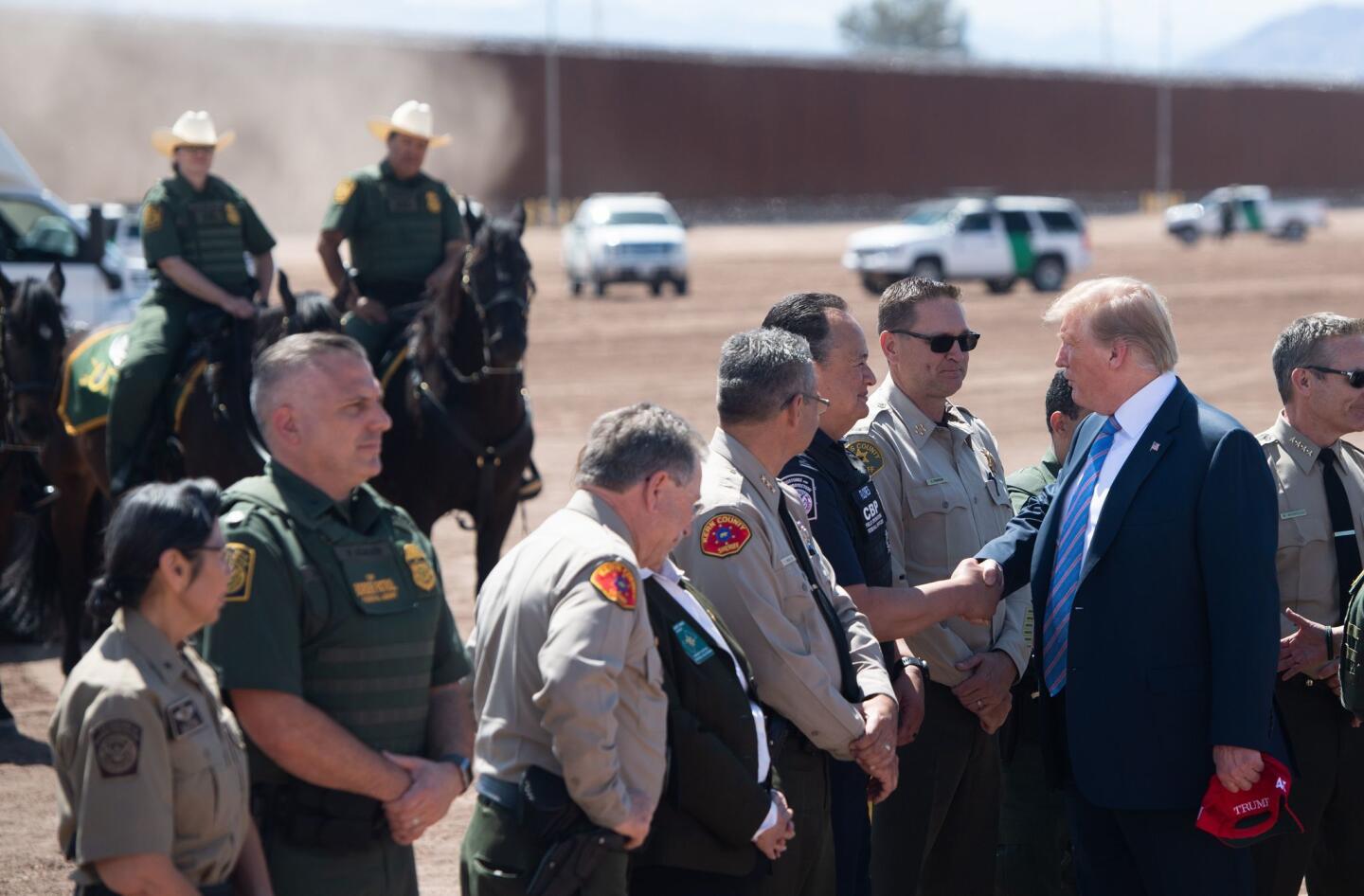 President Trump visits U.S.-Mexico border and Los Angeles