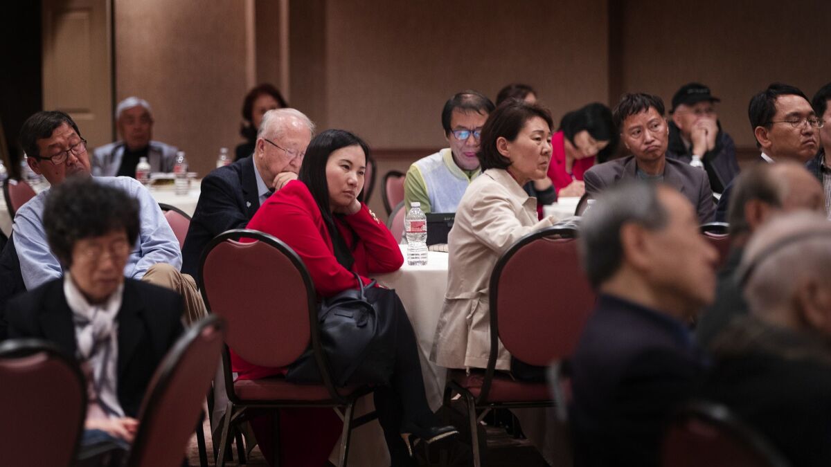A Koreatown audience, including some North Koreans, listens to a panel of three North Korean refugees discuss the canceled U.S.-North Korea summit.