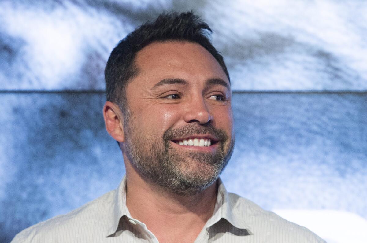 Oscar De La Hoya attends the weigh-in of David Lemieux and Hassan N'Dam on June 19 in Montreal. His cousin, Diego De La Hoya, is fighting Thursday night in Los Angeles.