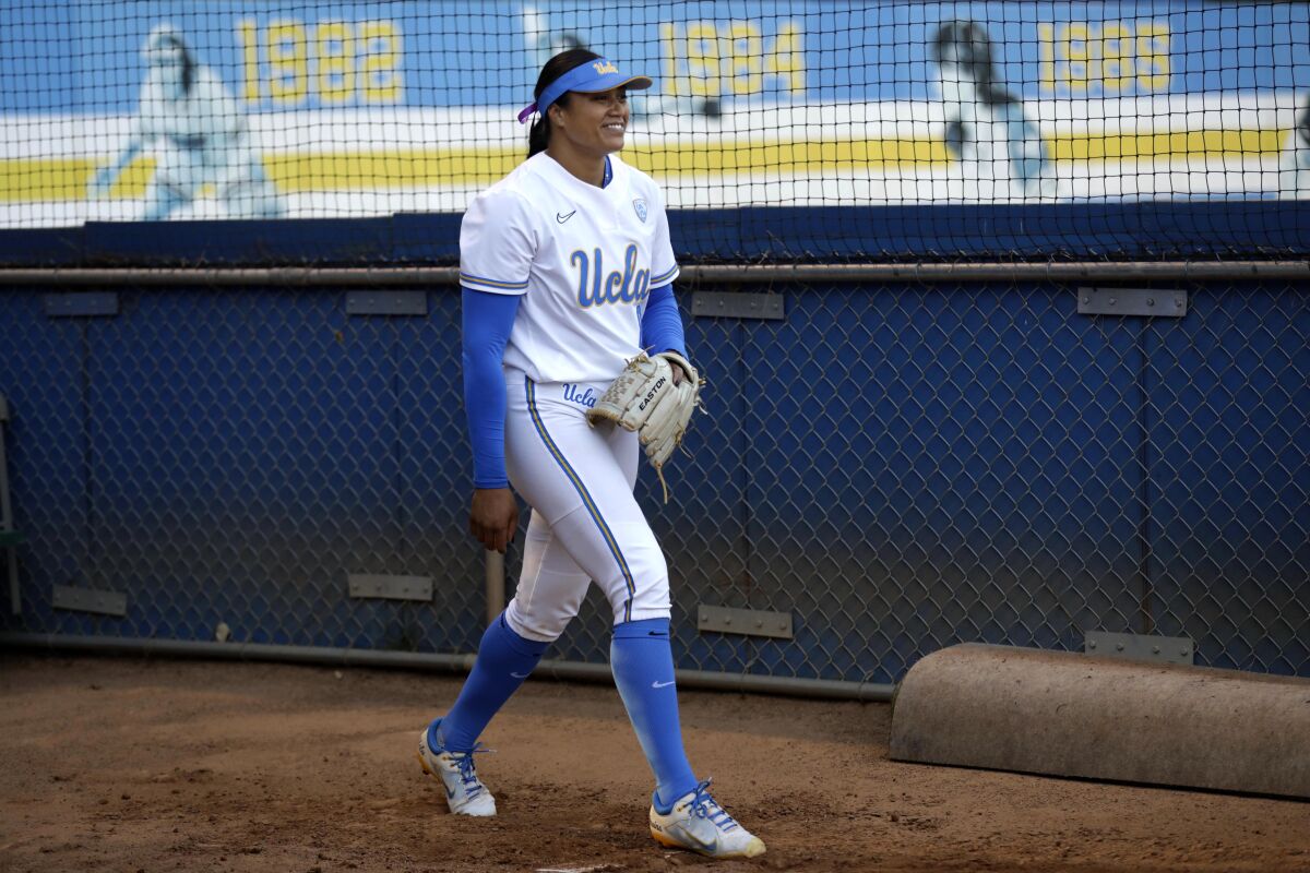 UCLA softball pitcher Megan Faraimo warms up in the bullpen before a game against Utah at Easton Stadium on the UCLA campus.