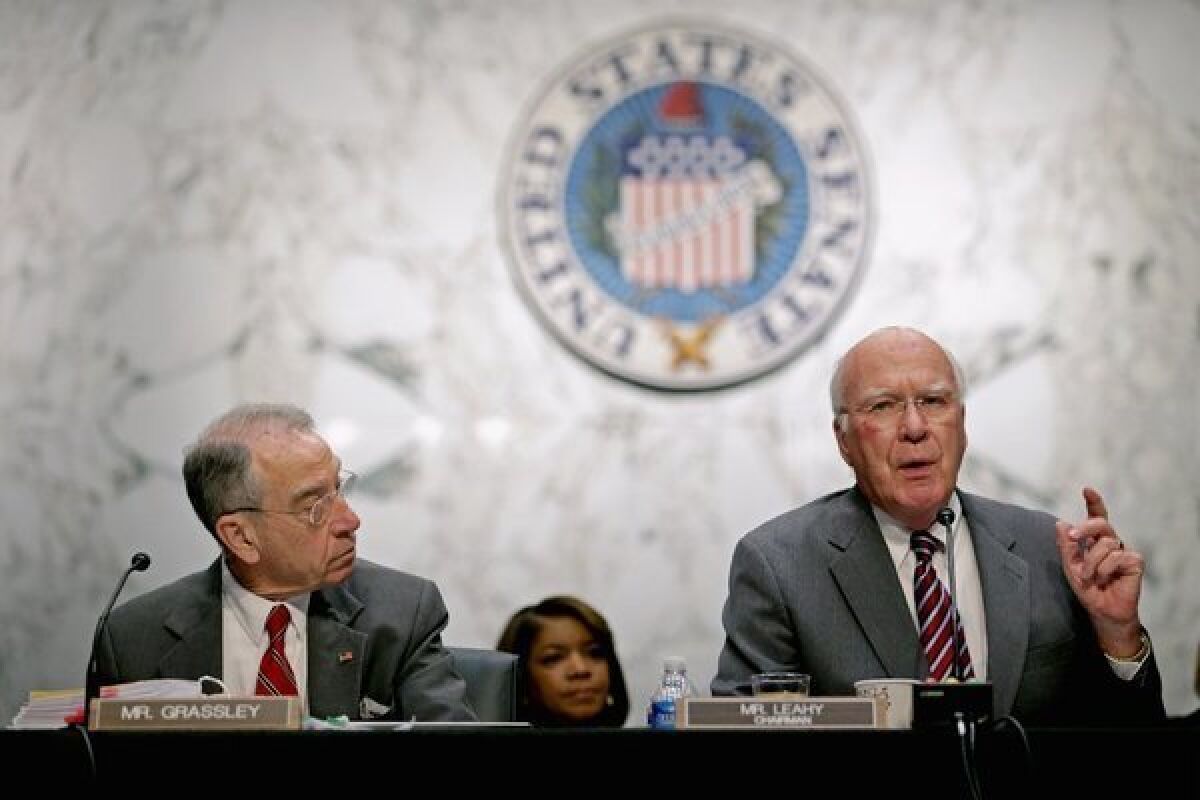 Sen. Charles Grassley (R-Iowa), left, and Senate Judiciary Committee Chairman Patrick Leahy (D-Vt.) during a committee meeting on immigration reform.