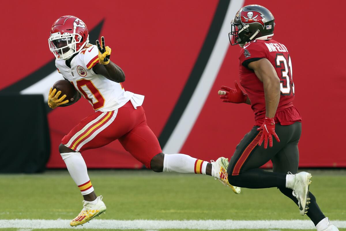 Kansas City Chiefs wide receiver Tyreek Hill reacts as he beats Tampa Bay Buccaneers strong safety Antoine Winfield Jr.