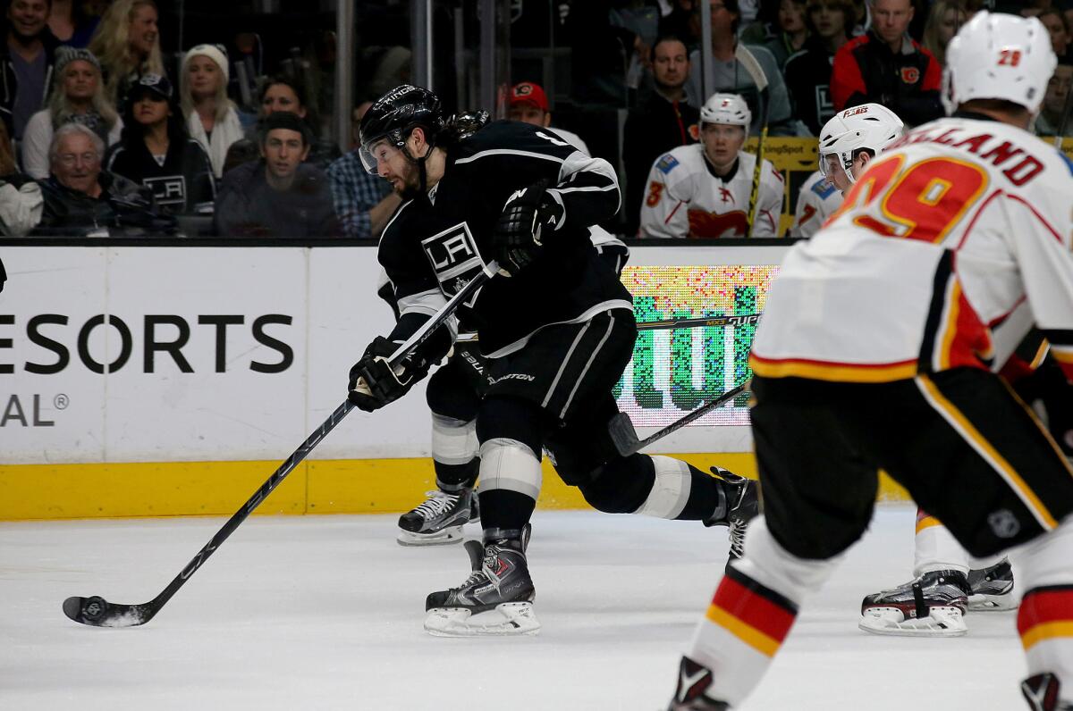 Kings defenseman Drew Doughty takes a shot on goal against the Flames in the first period.