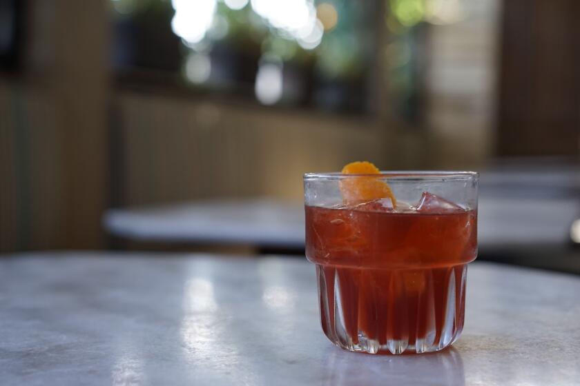 A $1 tax day Old Fashioned from Harlowe. Multiple bars and restaurants are offering food and drink specials for tax day.