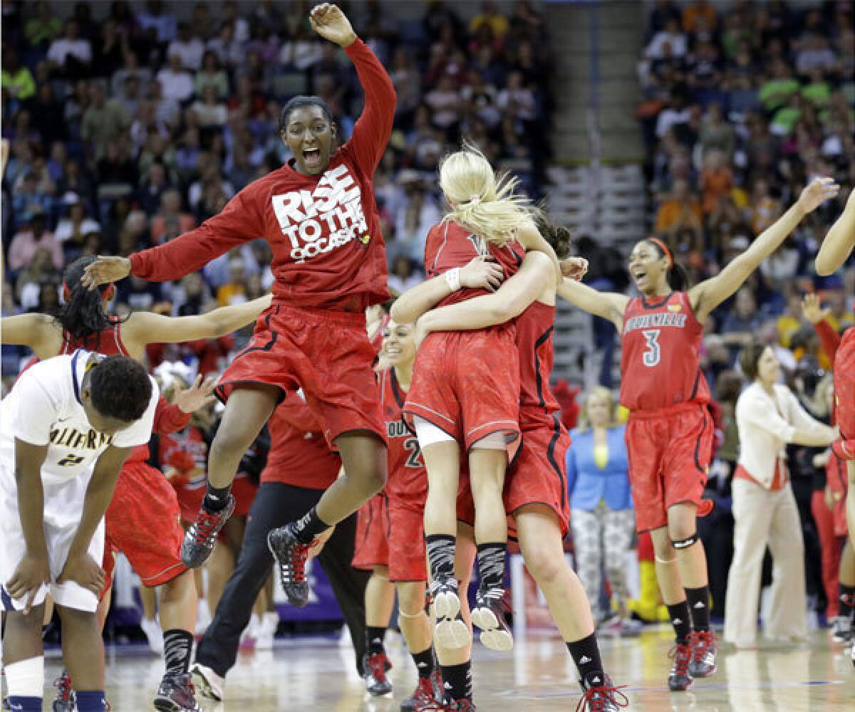 Louisville players celebrate after knocking off California to advance to the NCAA championship game.