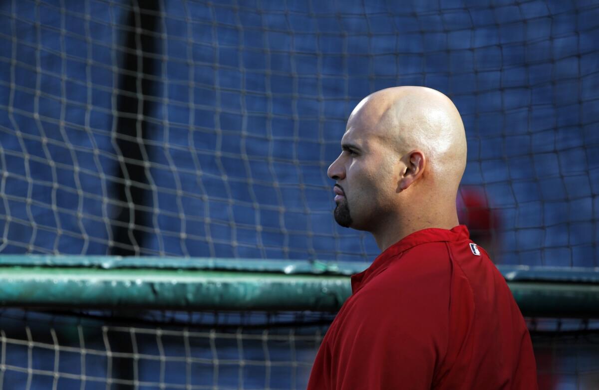 Angels slugger Albert Pujols will not play again this season because of an injured left foot.