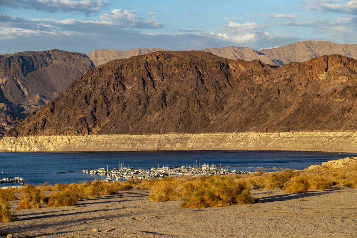 A "bathrub ring" showing falling water levels is visible at Lake Mead in July.