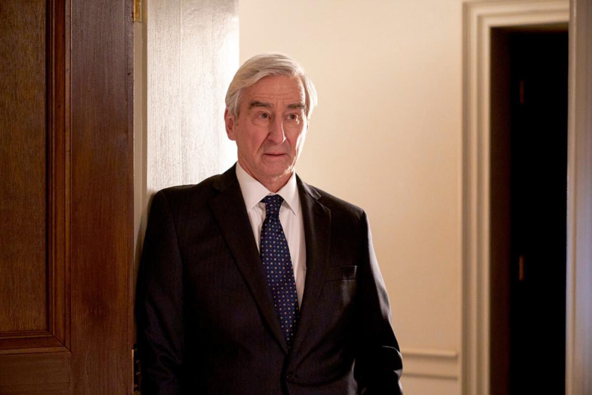 Sam Waterston as D.A. Jack McCoy wearing a suit and tie