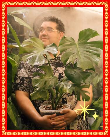 TORRANCE, CA - JULY 29: Jacob Choto in the greenhouse at his Torrance home.. Misters keep the humidity high - around 70-80 percent. Photographed at Choto greenhouse on Saturday, July 29, 2023 in Torrance, CA. (Myung J. Chun / Los Angeles Times)