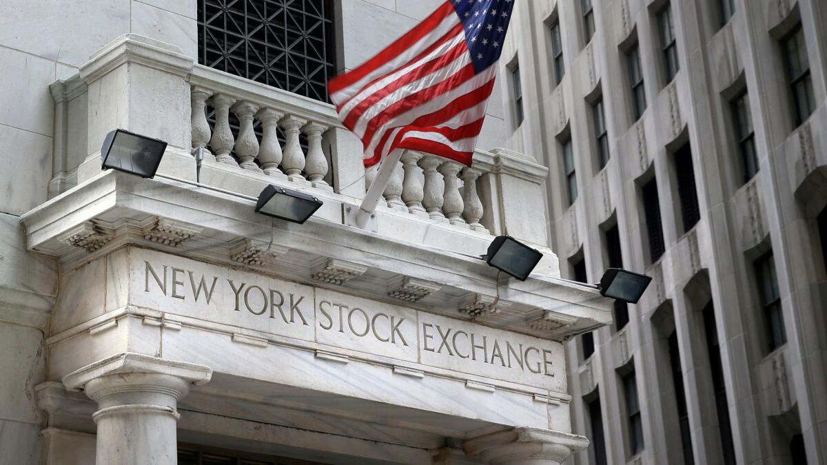 A flag flies at the New York Stock Exchange.