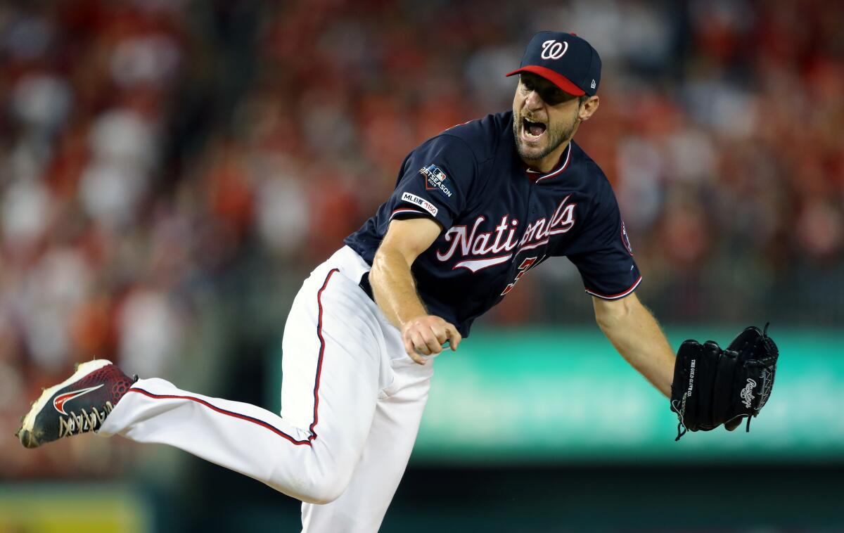 Nationals starter Max Scherzer reacts after a strike out during the fourth inning against the Dodgers.