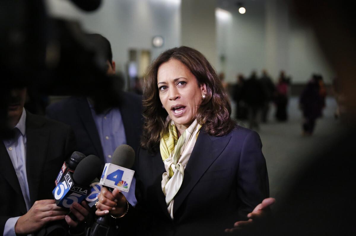 U.S. Senate candidate Kamala Harris talks to media after speaking at the Eid-al Fitr Services hosted by the Islamic Center of Southern California at the L.A. Convention Center in July.