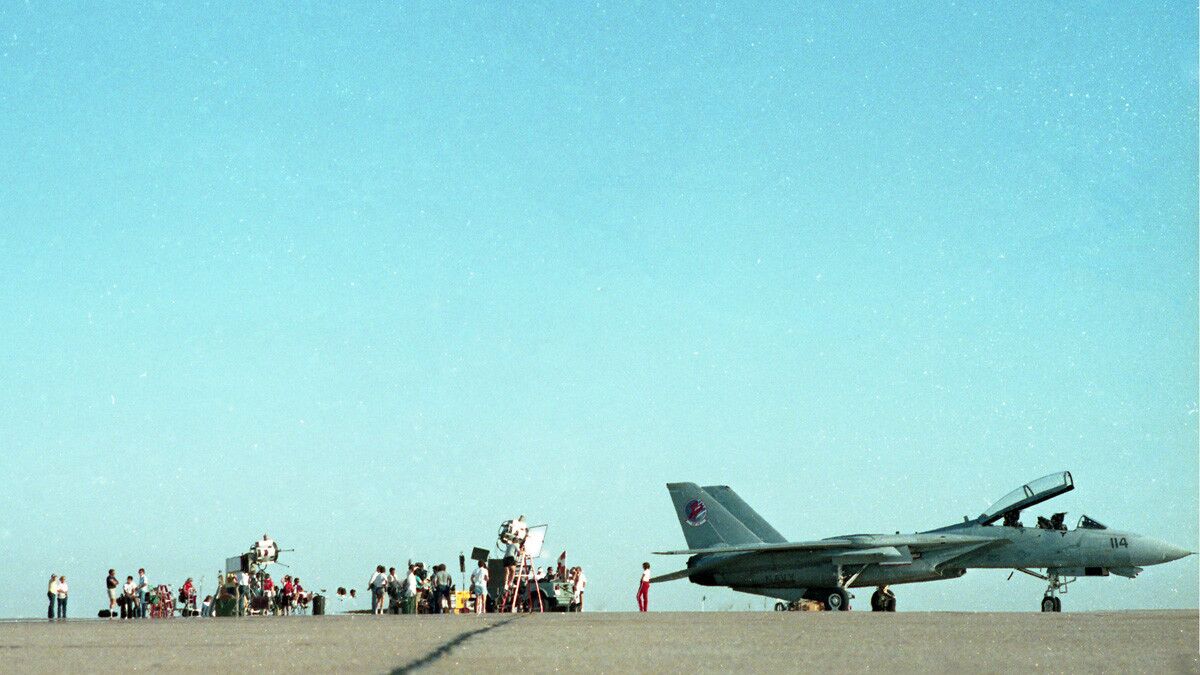 Film crew on the set of "Top Gun," at Miramar Naval Air Station on July 27, 1985. (Photo by Charles Starr/San Diego Union-Tribune) User Upload Caption: U-T file photos of pilots and planes at Miramar Naval Air Station during the filming of Paramount Pictures "Top Gun" movie in the summer of 1985.