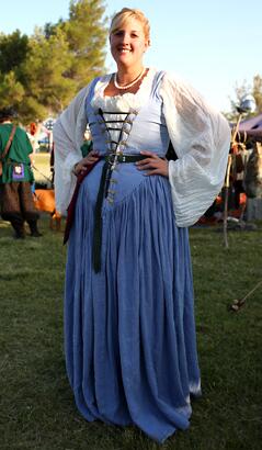 Started more than 40 years ago as a party idea by medieval-minded Berkeleyites, the Society for Creative Anachronism now claims 30,000 paid members and estimates it has twice as many participants worldwide. About 2,000 showed up at the Buena Vista Aquatic Recreational Area near Taft, Calif., for the Great Western War XII, Oct. 6-12. They wore hand-made ensembles of Elizabethans, Vikings, Persians and others, re-created with academic accuracy. Activities included sword battles, mead drinking, classes in armor repair and arrow-making, royal pageantry and a general chance to escape from the industrialized world. Participants identified themselves sometimes by their SCA names and, on occasion, by their modern world names. Cassandra Bailey of Los Angeles wears the garb of a 16th century Venetian, which she sewed herself.