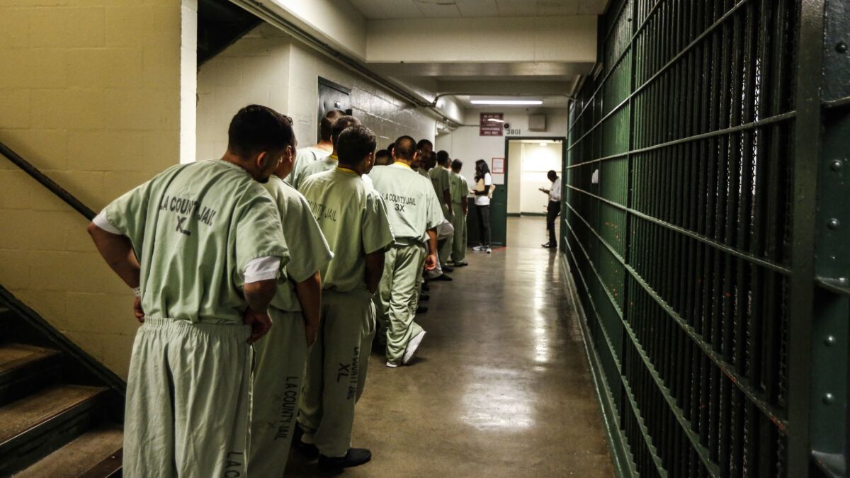 Inmates wait in line at Los Angeles County's Men's Central Jail.
