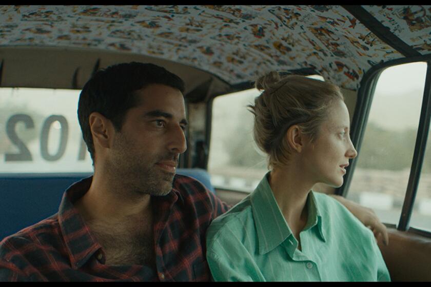 Karim Saleh and Andrea Riseborough in the movie "Luxor."