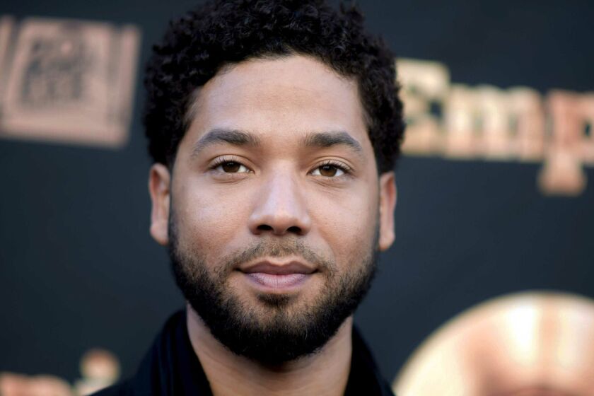 FILE - In this May 20, 2016 file photo, actor and singer Jussie Smollett attends the "Empire" FYC Event in Los Angeles. Chicago police say they're interviewing two "persons of interest" who surveillance photos show were in the downtown area where Smollett says he was attacked last month. A police spokesman said Thursday the two men aren't considered suspects but may have been in the area at the time Smollett says he was attacked. Smollett says two masked men shouted racial and homophobic slurs before beating him and putting a rope around his neck on Jan. 29. (Richard Shotwell/Invision/AP, File)