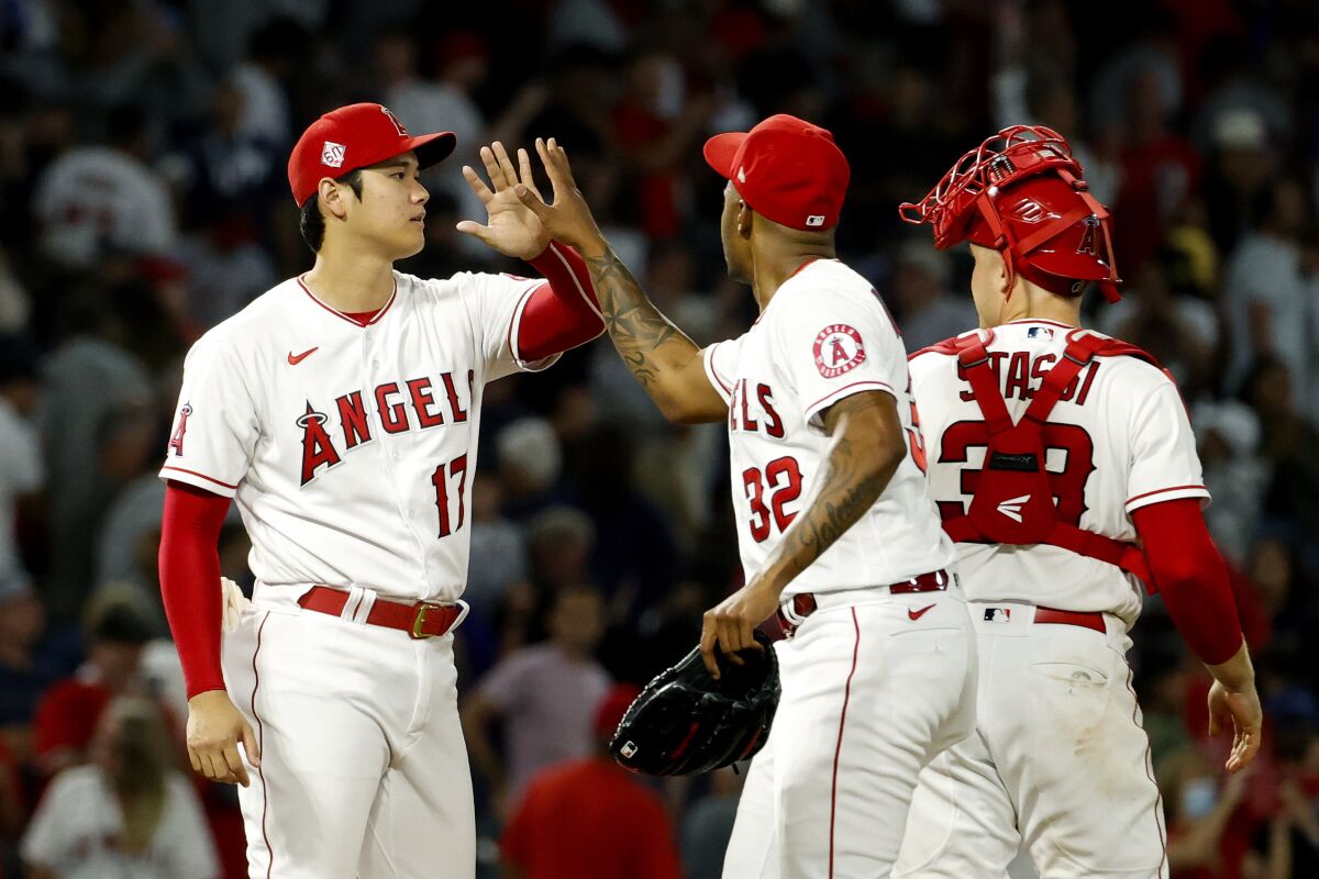 The Angels celebrate an 8-7 win over the New York Yankees.