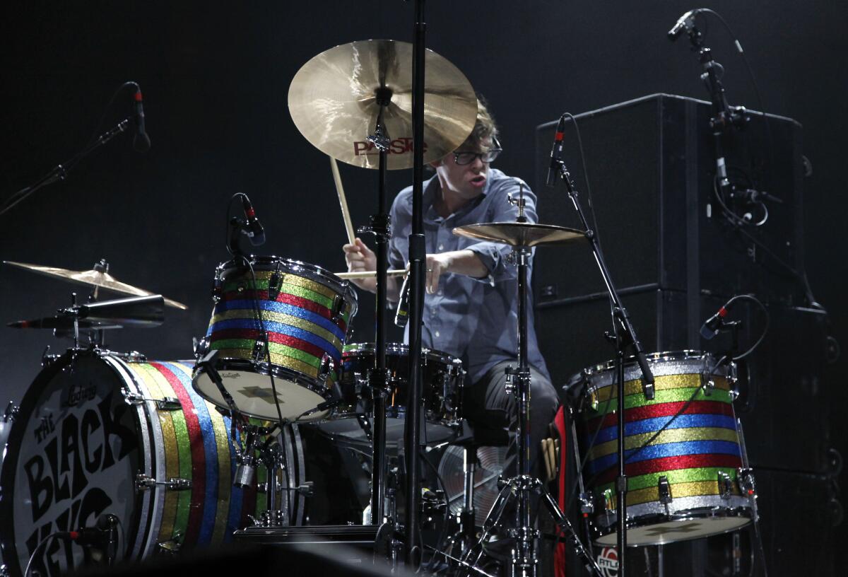 Drummer Patrick Carney of the Black Keys performs during the band's sold-out concert at the Forum on Thursday.