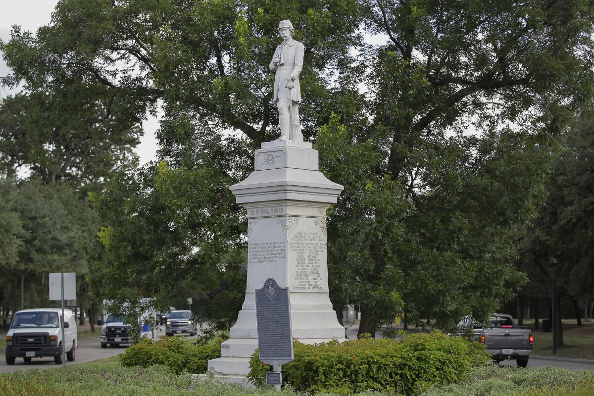 The statue of Confederate artillery commander Richard W. “Dick” Dowling statue sits in Hermann Park in Houston.