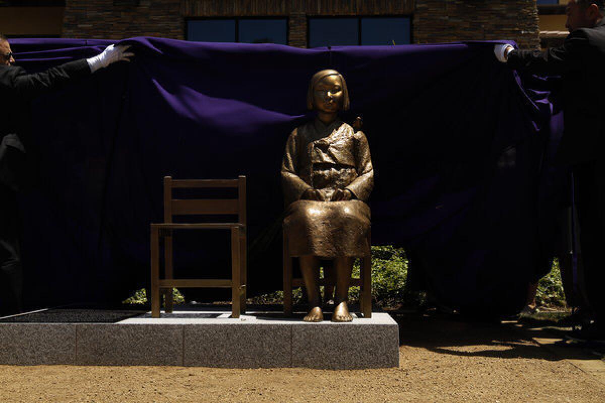 A monument remembering Asian women and girls who were held as sex slaves by the Japanese Imperial Army during World War II -- commonly known as comfort women -- was officially unveiled during a ceremony at Central Park in Glendale on July 30.