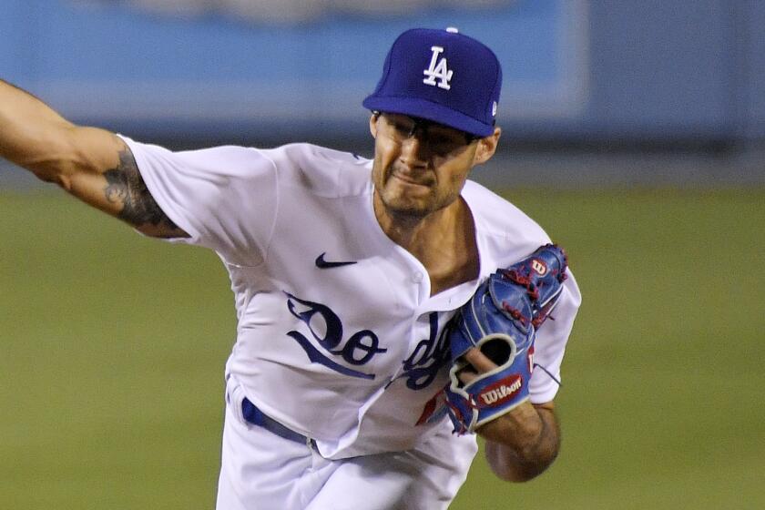 Los Angeles Dodgers relief pitcher Joe Kelly throws to the plate during the eighth inning.