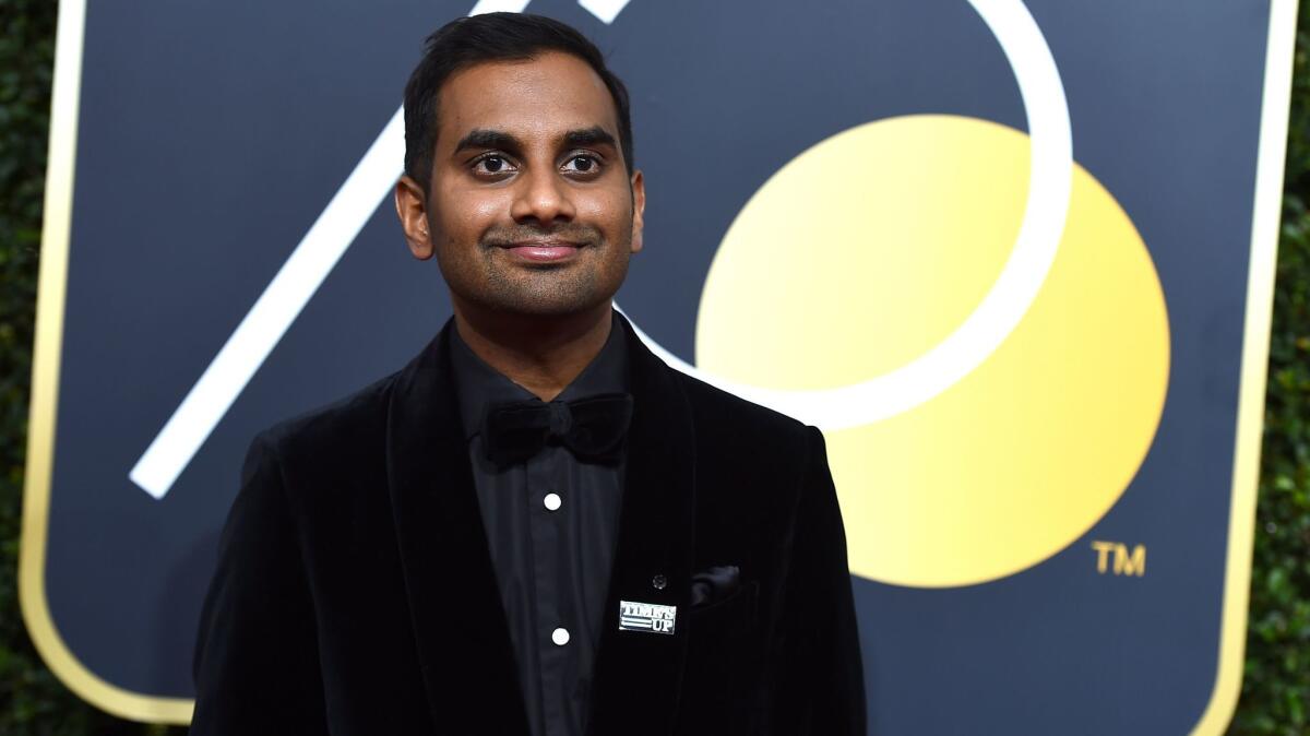 Aziz Ansari is seen at the Golden Globes in Beverly Hills on Jan. 7 wearing a "Time's Up" pin.