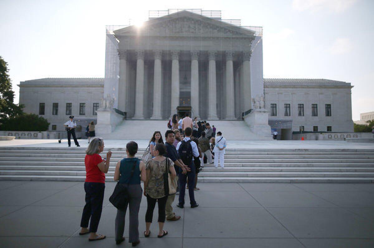 The Supreme Court told the high court of Oklahoma to clarify a new state law restricting the use of the RU-486 abortion pill.