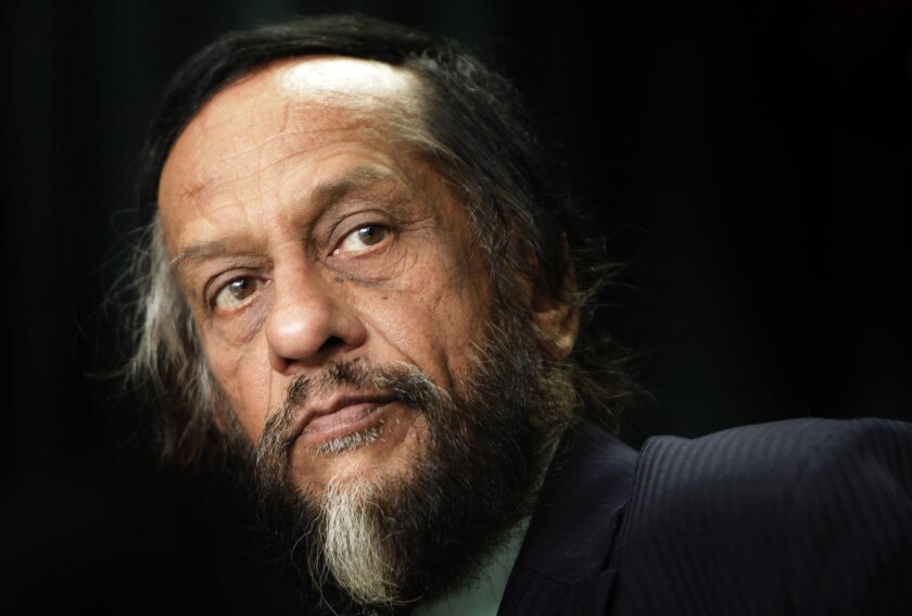 FILE- In this Dec. 1, 2009, file photo, Rajendra Kumar Pachauri attends a press conference in New Delhi, India. The Indian environmentalist, under whose chairmanship the UN's Intergovernmental Panel on Climate Change won the Nobel Peace Prize alongside former U.S. Vice President Al Gore in 2007, has died after a heart surgery. Pachauri’s death was announced late Thursday, Feb. 13, 2020, by The Energy and Resources Institute, or TERI, a research group he headed until 2016 in New Delhi. He was 79. (AP Photo/Gurinder Osan, file)