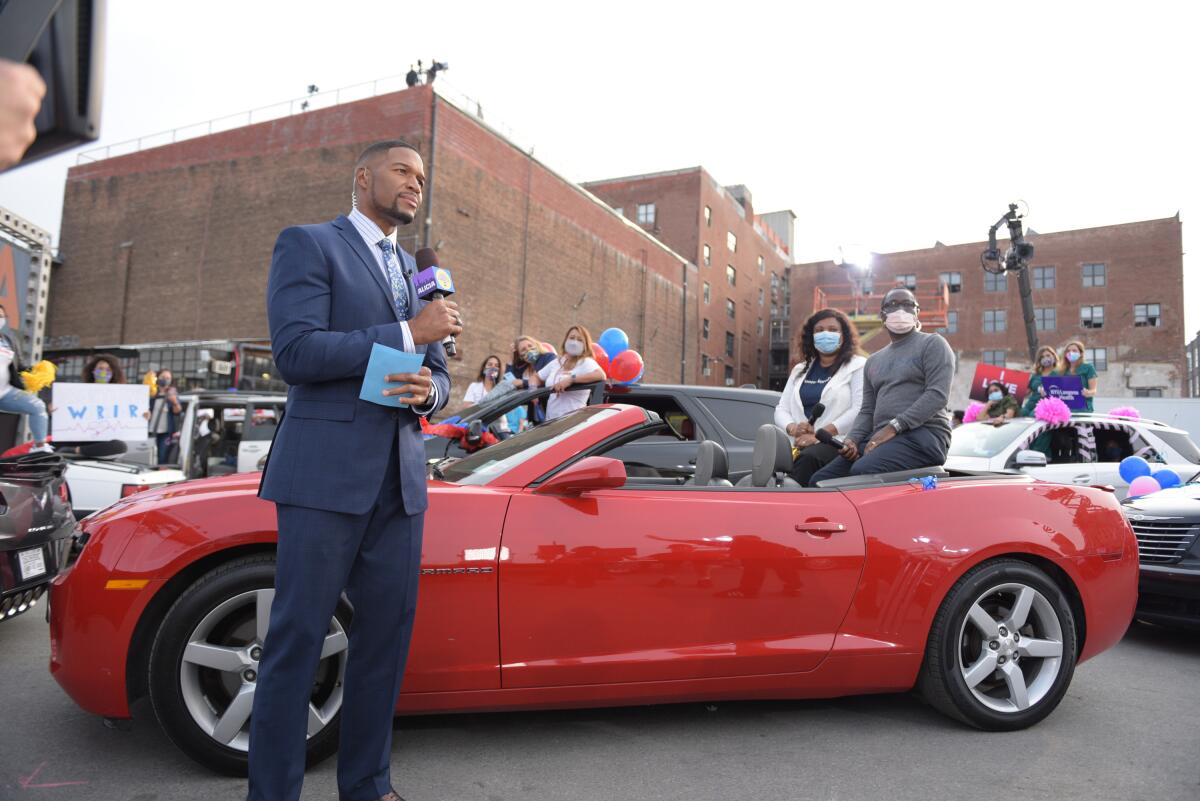 "GMA" co-host Michael Strahan hosting a drive-in Alicia Keys concert on the ABC morning program last summer.