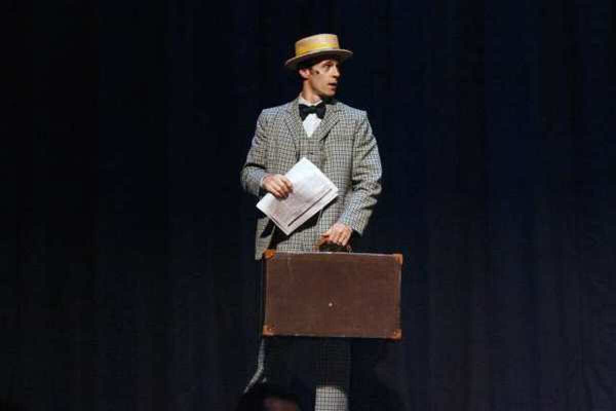 Michael Thatcher performs onstage during the first scene of dress rehearsal of "The Music Man" at Hoover High School in Glendale.