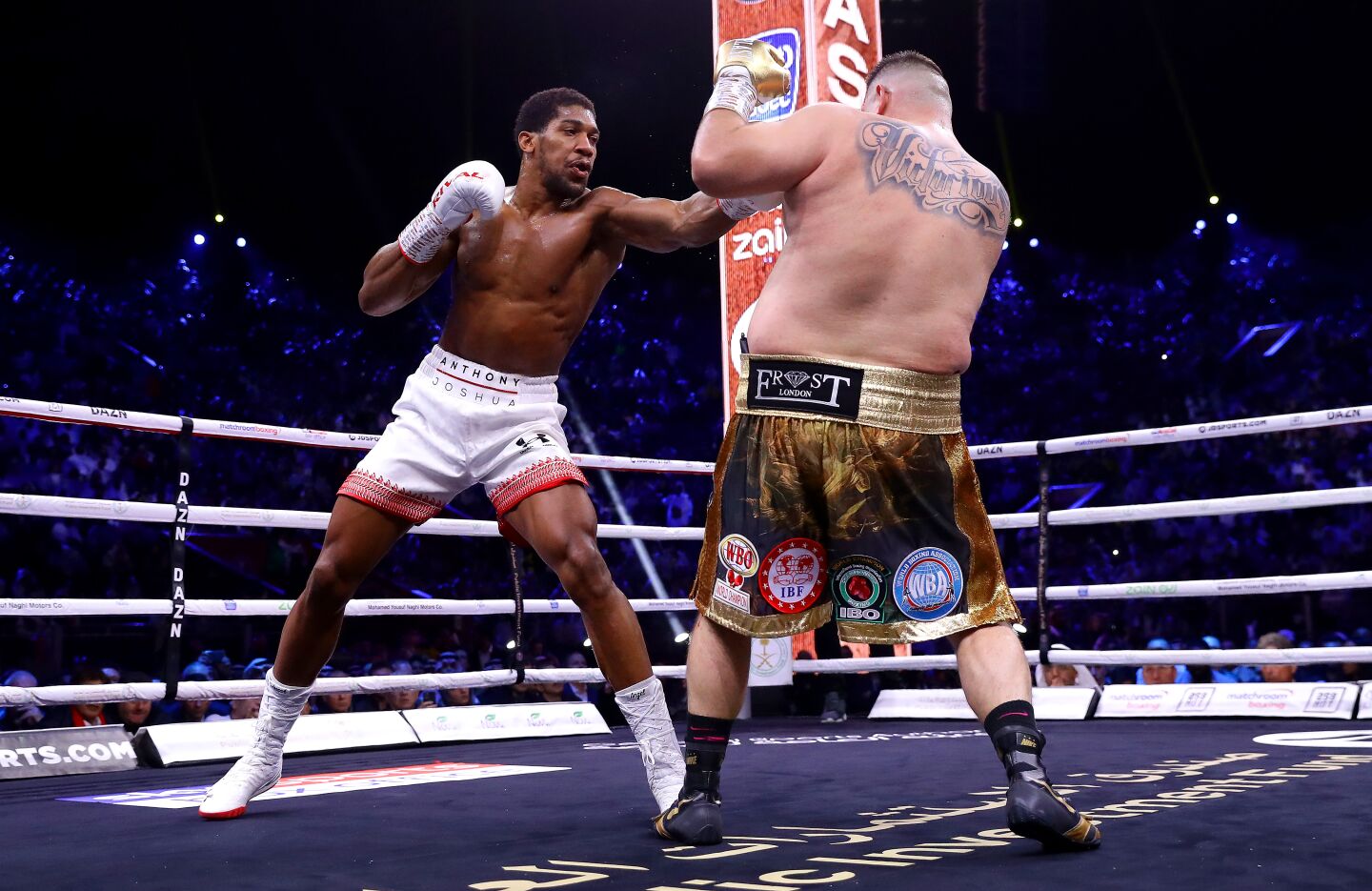Anthony Joshua hits Andy Ruiz Jr. with a left during their heavyweight title fight on Dec. 7 in Diriyah, Saudi Arabia.