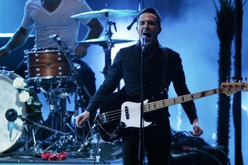 The Killers, here performing at the Hollywood Bowl in 2009, have released a video for the song "Here With Me" that was directed by Tim Burton.
