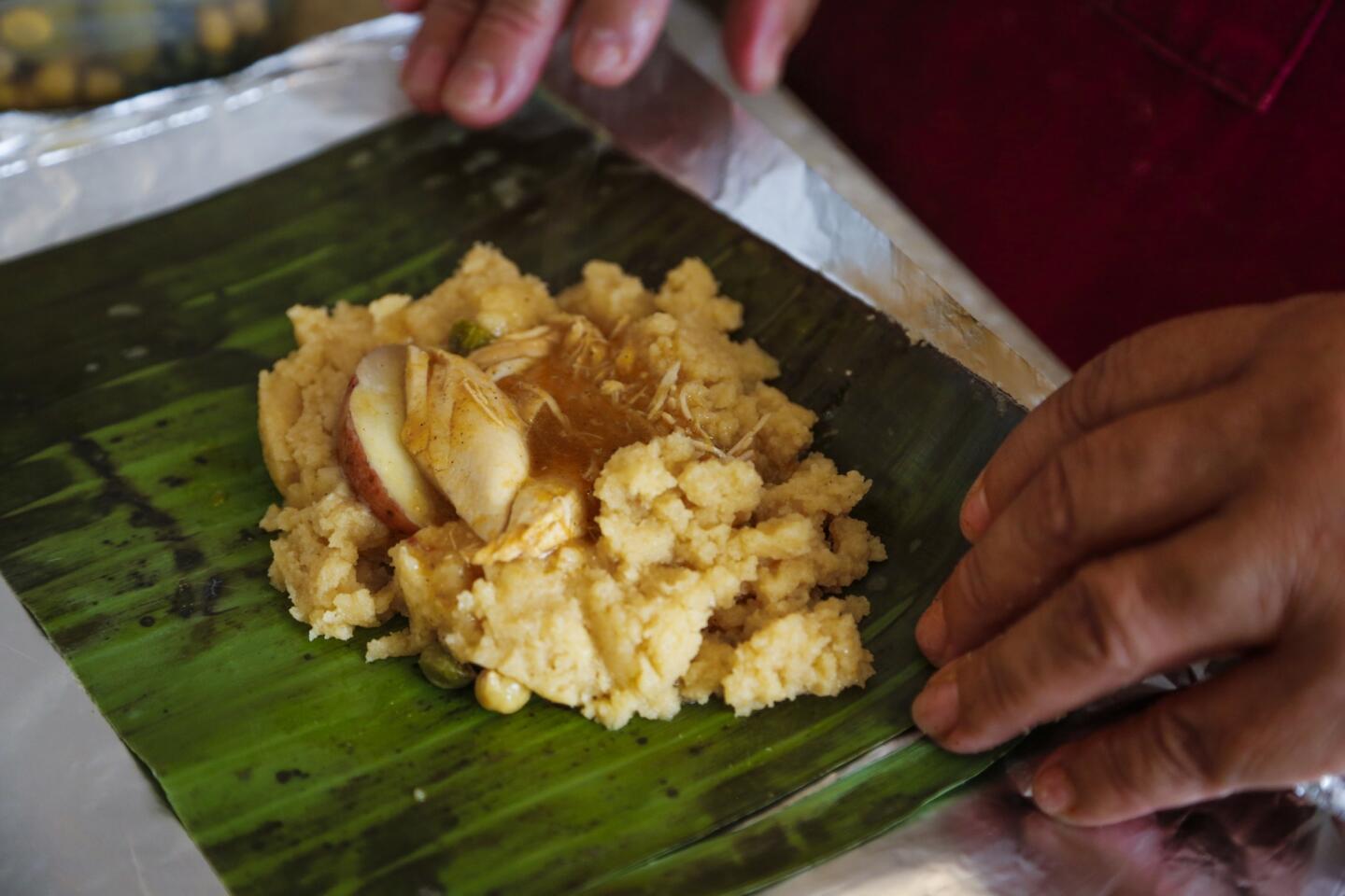 Preparing Salvadoran tamales