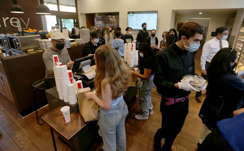 Students get lunch at a cafeteria