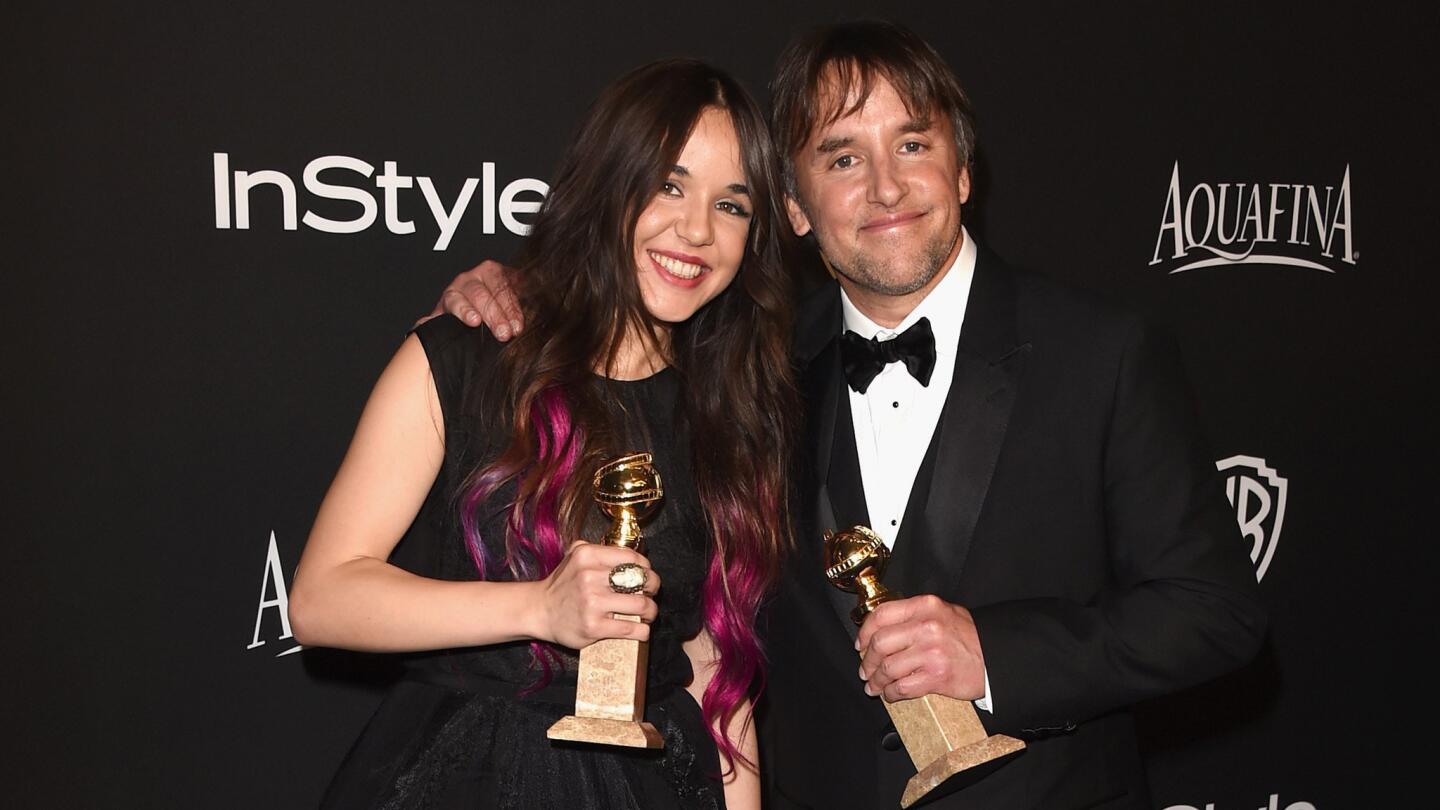 Actress Lorelei Linklater, left, and her director father Richard Linklater of "Boyhood." The film won the Golden Globe for motion picture, drama, and he won the director prize.