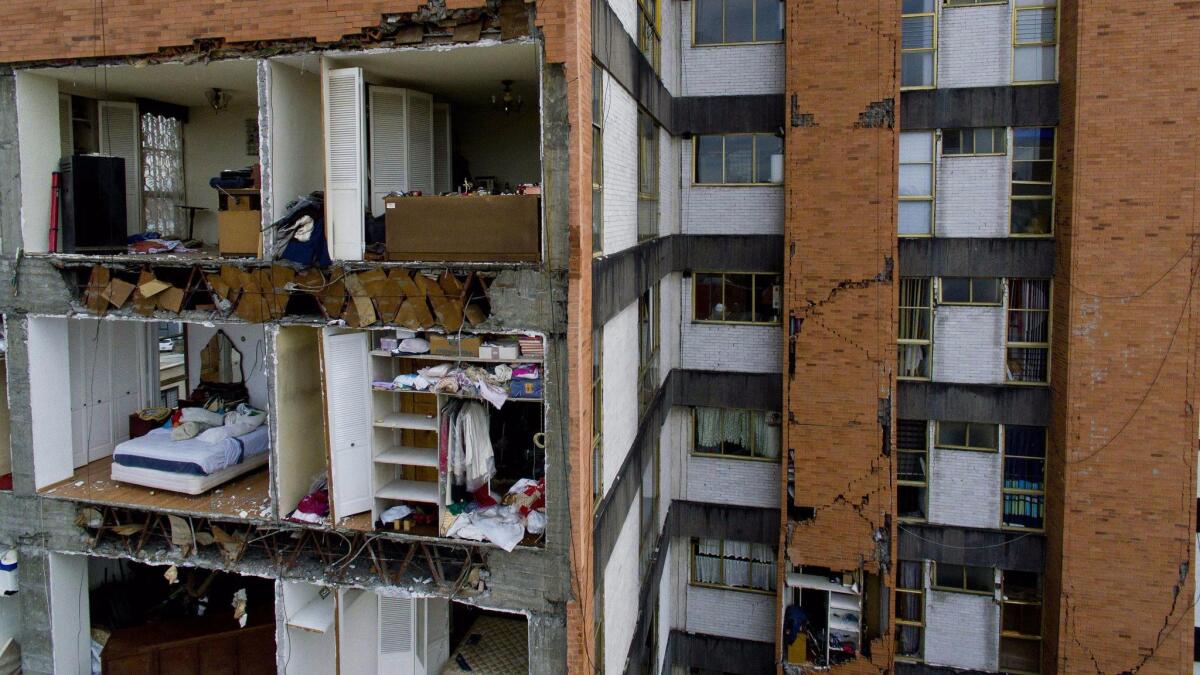 Thousands in Mexico City were left homeless by the Sept. 19 earthquake, and experts say that will put pressure on the city's real estate market. Above, a multistory apartment was one of thousands that suffered damage.