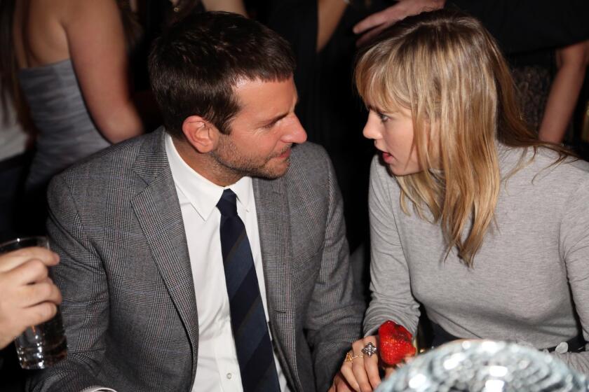Bradley Cooper and Suki Waterhouse attend the "American Hustle" premiere party together.