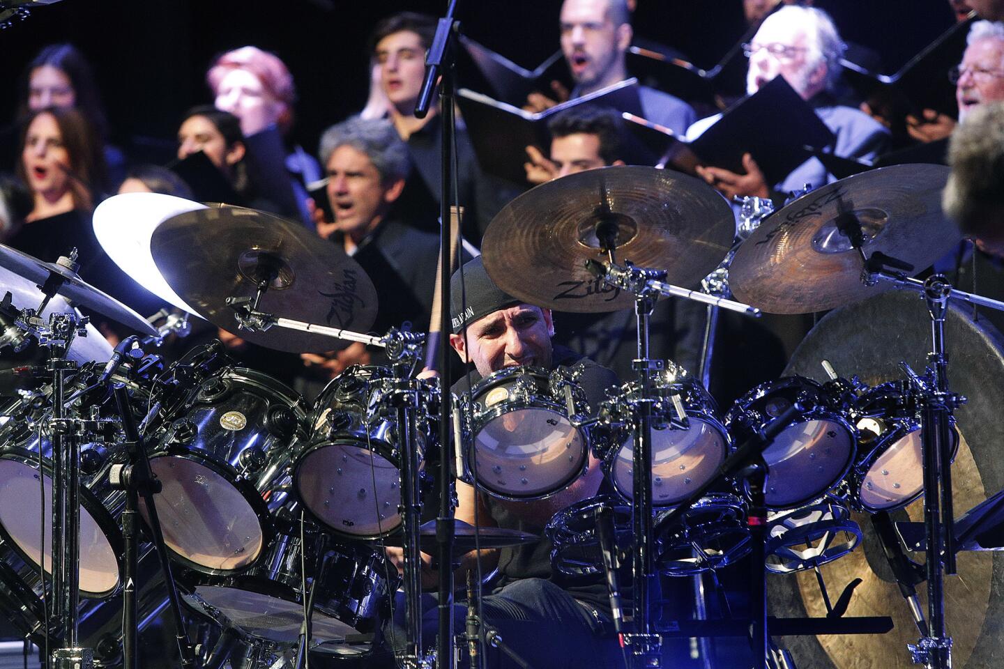 Musician Jacob Armen plays on an enormous drum set with the Homenetmen Ararat Chapter Choir and the Glendale College Concert Singers at the City of Glendale's 18th annual Armenian Genocide commemorative event at the Alex Theatre on Wednesday, April 24, 2019. Marking 104 years from the start of the Armenian Genocide, U.S. Congressman Adam Schiff, State Senator Anthony Portantino, and Ambassador Armen Baibourtian of the Consul General of Armenia in Los Angeles spoke.