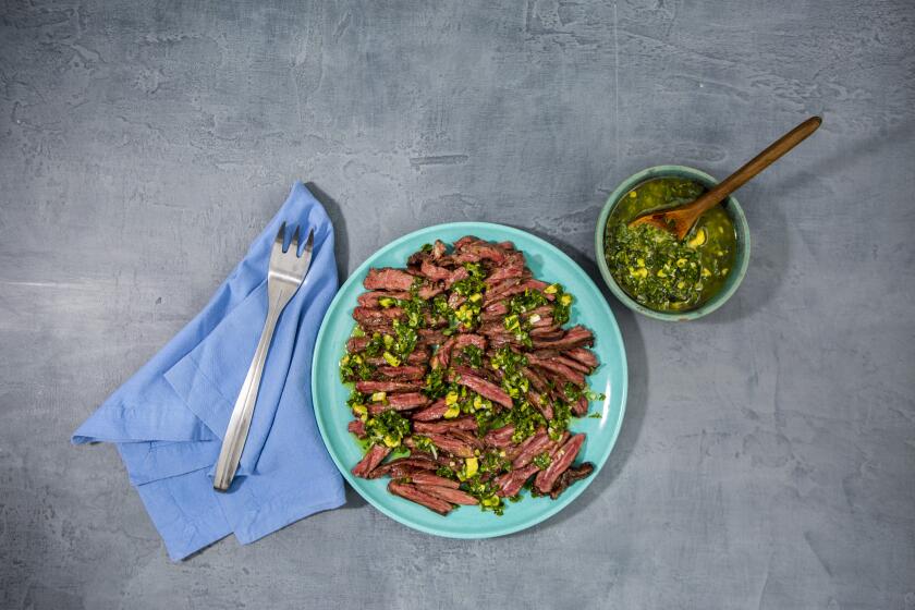 LOS ANGELES, CA--JUNE 13, 2019--Skirt steak with marjoram and lime salsa, from Los Angeles Times food writer Ben Mims, photographed on a Los Angeles, CA, rooftop, June 13, 2019, as part of a "best beef to grill on fourth of July." Selected meat: Aged ribeye steak with pistachio gremolata and charred balsamic broccolini (from Vartan Abgaryan at Yours Truly in Venice), Prime hangar steak with szechuan spices and citrus (from chef Brandon Kida, at Hinoki & the Bird in Century City), dry-aged burger with gruyere and homemade mayonnaise (adapted from Katie Flannery, at Flannery Beef) and skirt steak with marjoram and lime salsa, from writer Ben Mims. (Jay L. Clendenin / Los Angeles Times)