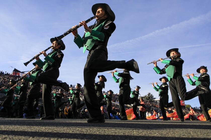 PASADENA CA., JANUARY 1, 2020: The Japan Honor Green Band dance their way down Colorado Blvd during the 131st Rose Parade (Mark Boster For the LA Times).