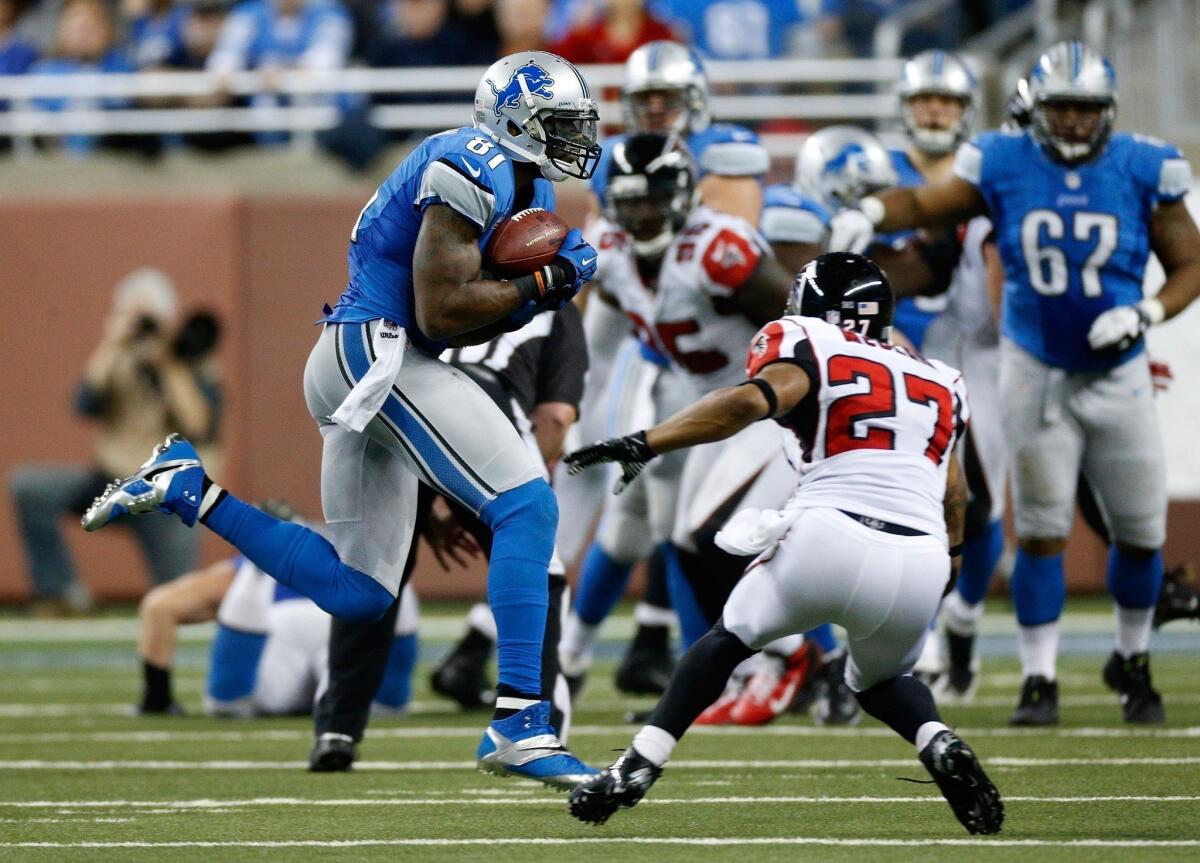 Detroit Lions receiver Calvin Johnson catches a pass against the Atlanta Falcons.