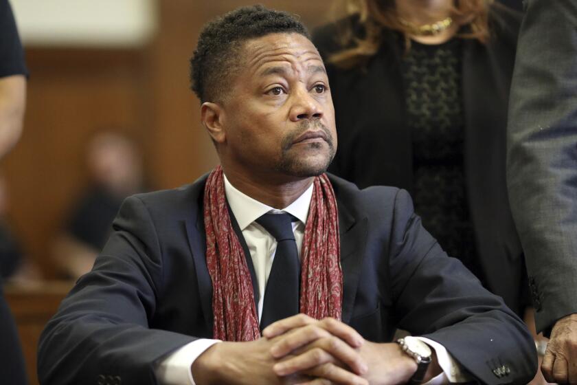 FILE - In this Jan. 22, 2020, file photo, actor Cuba Gooding Jr. appears in court, in New York. Gooding is accused of raping a woman twice in a Manhattan hotel room in 2013, according to a lawsuit dated Monday, Aug. 17, 2020, but filed publicly Tuesday in Manhattan federal court. Attorney Mark Heller, who represents the 52-year-old actor, said the “alleged event never took place." (Alec Tabak/The Daily News via AP, Pool, File)