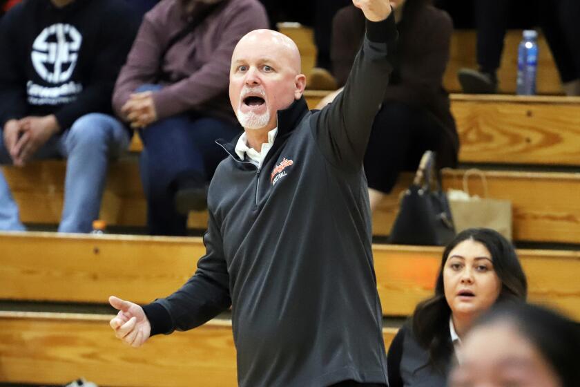 Huntington Beach's head coach Russell McClurg during Edison High School girls basketball against Huntington Beach High School girls' basketball game in the Sunset Conference crossover girls' basketball game at Huntington Beach High School in Huntington Beach on Saturday, January 6, 2024. (Photo by James Carbone)