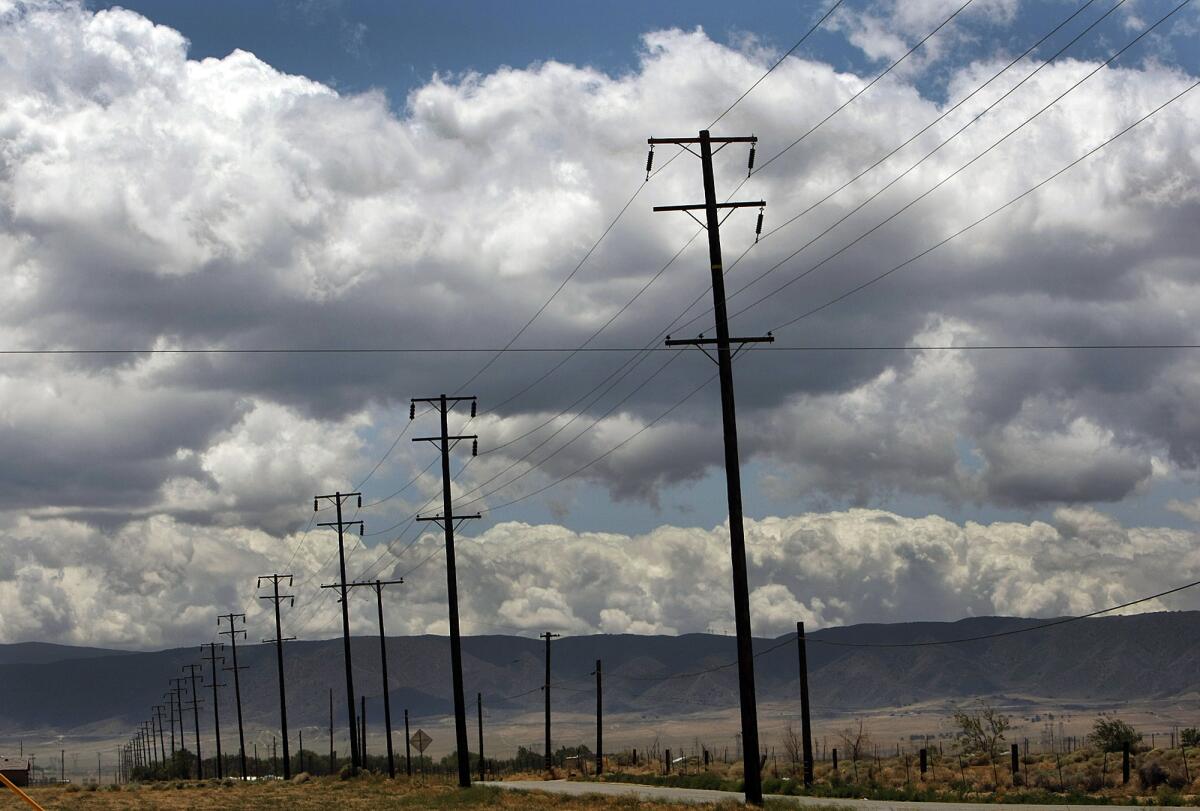 Clouds in the Antelope Valley are pushed by high winds as a storm system passed through Tuesday.