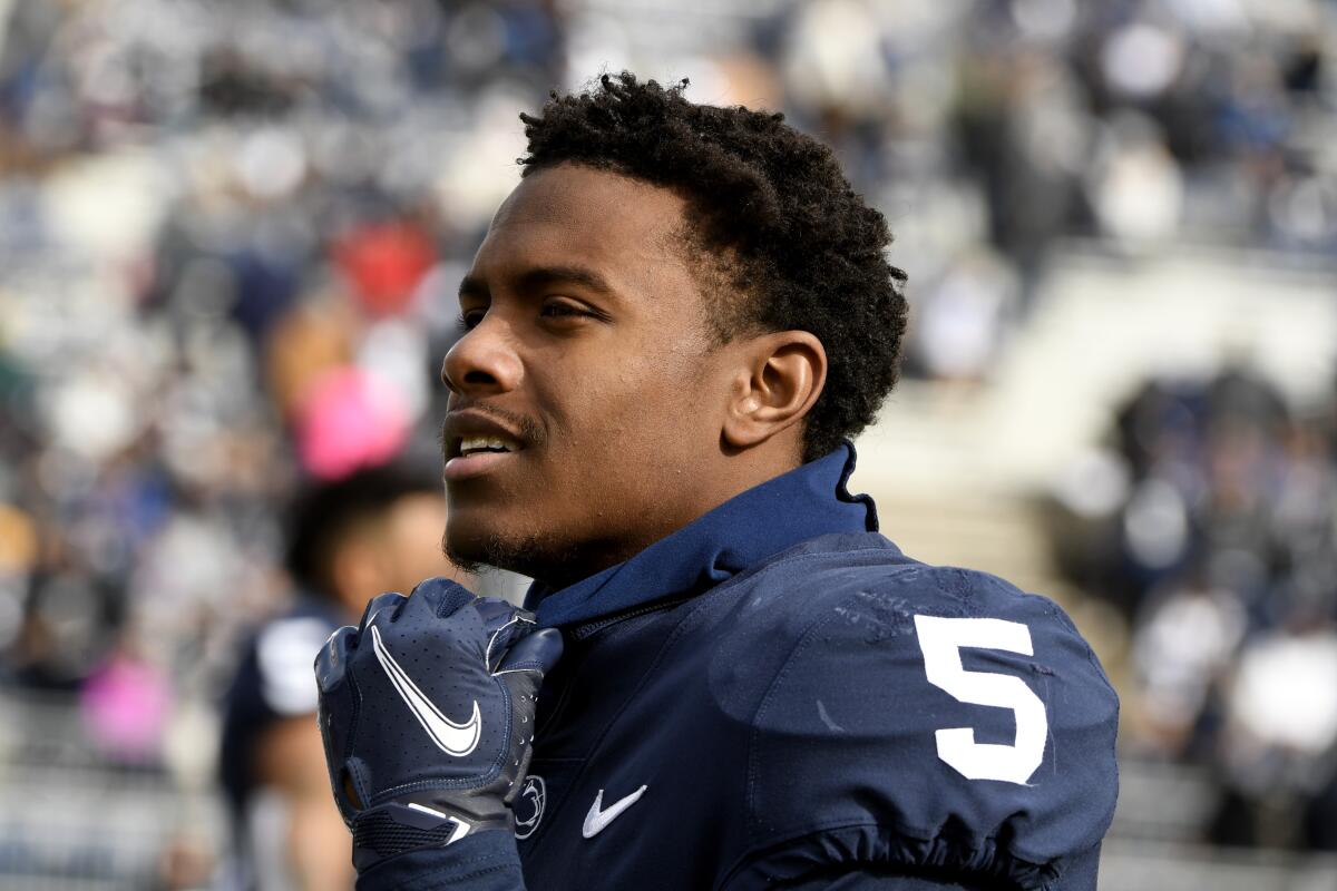 Penn State wide receiver Jahan Dotson participates in senior day festivities.