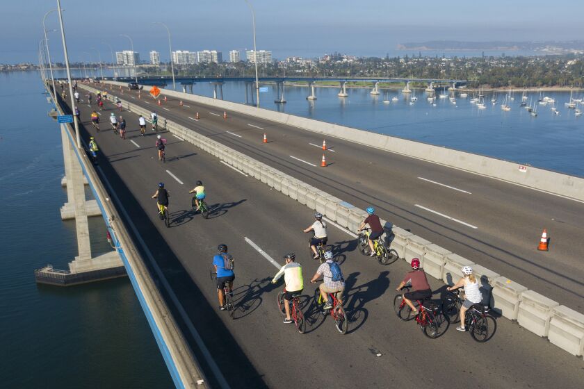 Bicyclists ride over the San Diego-Coronado Bridge during the 12th Annual Bike the Bay, a non-competitive community 25-mile bike ride through the five cities surrounding San Diego Bay via the Bayshore Bikeway on Sunday, August 25, 2019.