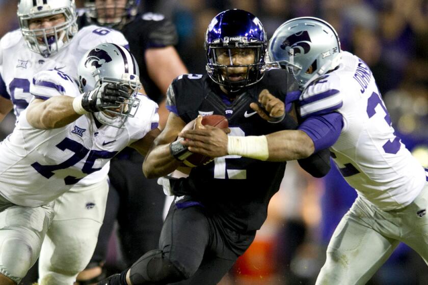 Texas Christian quarterback Trevone Boykin scrambles from the pocket against Kansas State in the first half Saturday.
