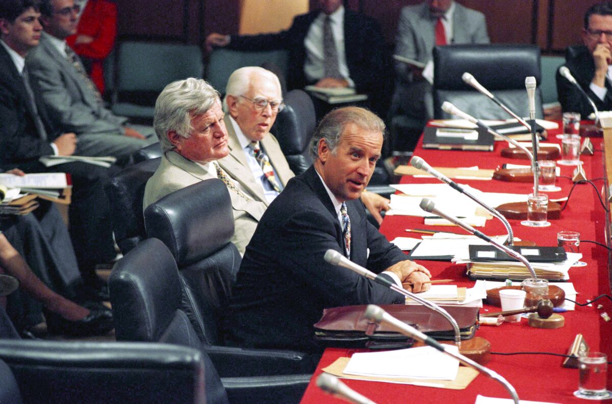 FILE - Sen. Joseph Biden, D-Del., chairman of the Senate Judiciary Committee, right, questions Supreme Court nominee Stephen Breyer during Breyer's confirmation hearing on Capitol Hill in Washington, July 14, 1994. Committee members Sen. Edward Kennedy, D-Mass., left, and Sen. Howard Metzenbaum, D-Ohio, look on during the proceeding. Biden knows better than anyone the unexpected turns a Supreme Court nomination can take after it lands on Capitol Hill. (AP Photo/John Duricka, File)